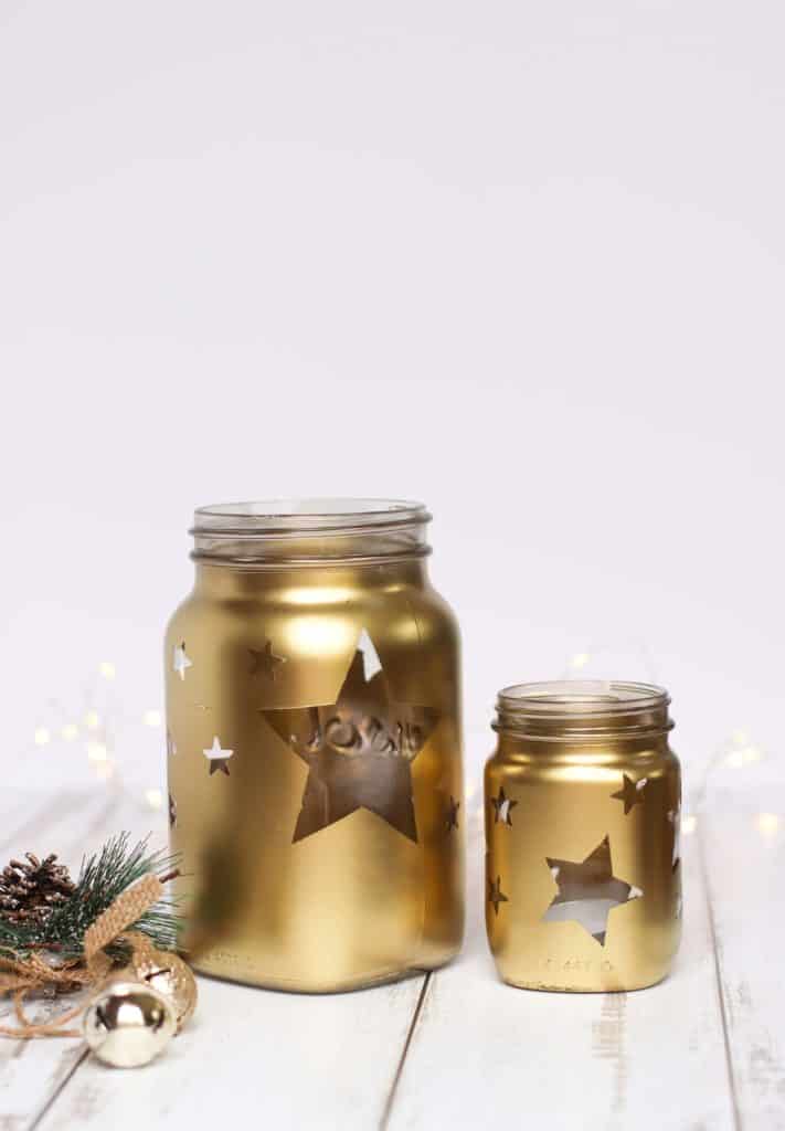 Upcycled mason jar lanterns. DIY Christmas table decor 