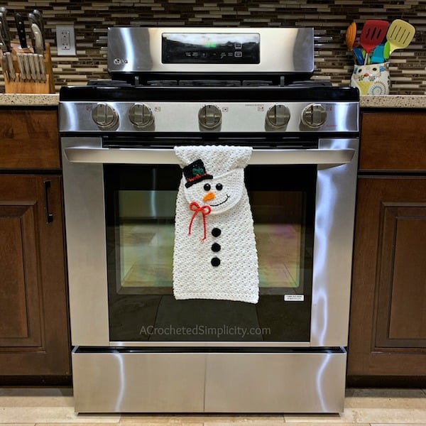 Crochet snowman kitchen towel
