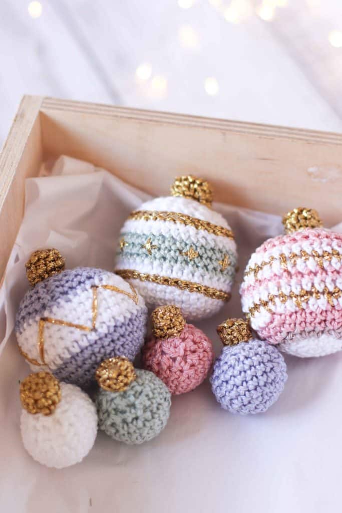 Large and tiny crochet Christmas baubles in box