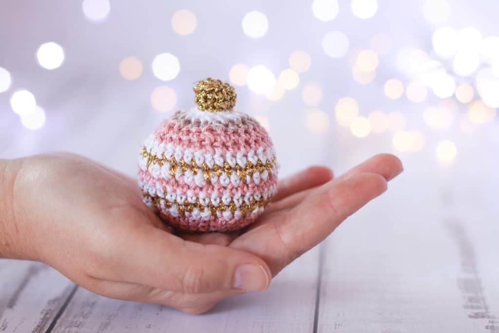 pink, white and gold crochet Christmas ornament 