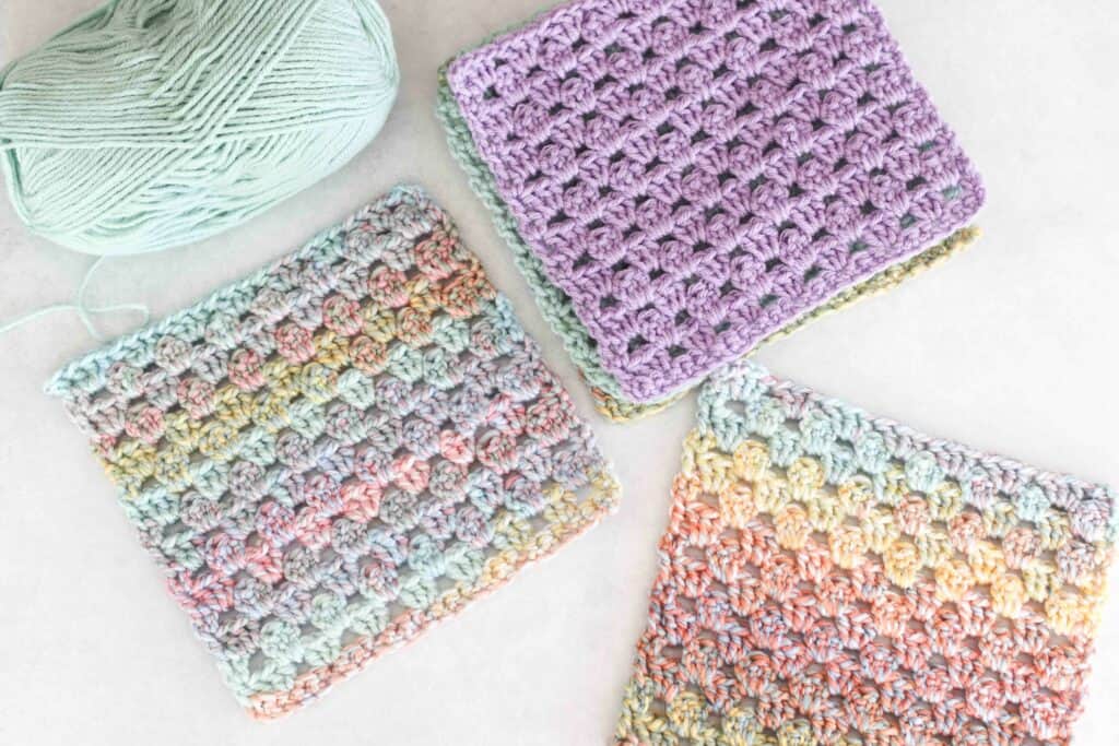 Pastel coloured crochet squares made following a simple granny square pattern