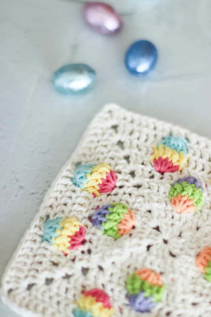 A close up of the crochet Easter eggs on the Easter granny square